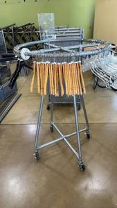 lot 87 image: OPTO Round Clothing Rack with Wooden Hangers