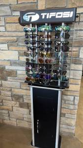 lot 97 image: Tifosi Sunglasses Display with 29 Pairs of Sunglasses