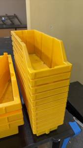 lot 504 image: Stack of 9 Industrial Yellow Plastic Storage Bins