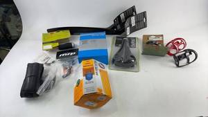 lot 518 image: Collection of Bicycle Accessories Including Saddle, Grips, and More