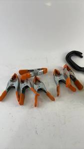 lot 551 image: Assortment of Clamps, Caution Tape, and Hooks