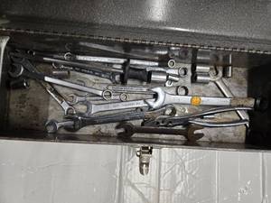 A metal toolbox plus lots of assorted hand tools (Used)