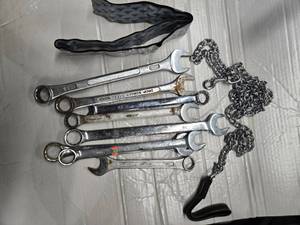lot 12 image: Lot of 7 huge wrenches, a dog chain and a a dry adhesive ( USED)