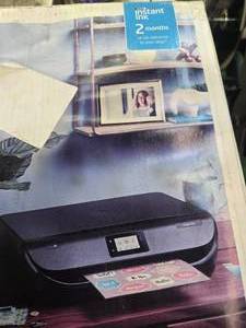 lot 38 image: HP Envy 5055 Photo Printer with photo Papers (New)