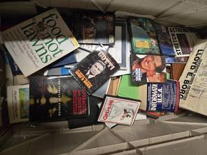 lot 97 image: Lots of books, DVDs, and magazines. Box not included in this sale