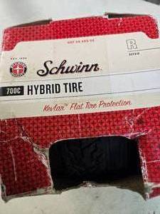 lot 106 image: Schwinn 700c Hybrid Tire (NEW)