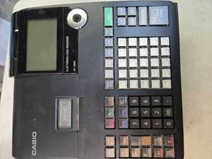 lot 121 image: Casio  Cashier Register