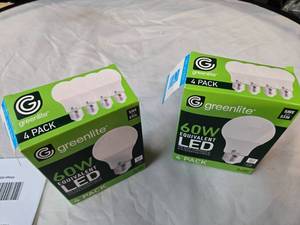 lot 162 image: Lot of 8 LED Greenlite 60W Equivalent Light Bulbs (4 packs in each of the two boxes) New