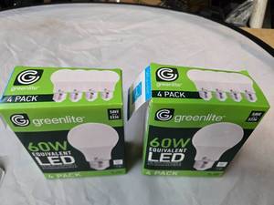 lot 164 image: Lot of 8 LED Greenlite 60W Equivalent Light Bulbs (4 packs in each of the two boxes) New