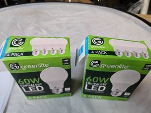 lot 165 image: Lot of 8 LED Greenlite 60W Equivalent Light Bulbs (4 packs in each of the two boxes) New