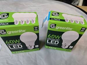 lot 168 image: Lot of 8 LED Greenlite 60W Equivalent Light Bulbs (4 packs in each of the two boxes) New