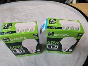 lot 172 image: Lot of 8 LED Greenlite 60W Equivalent Light Bulbs (4 packs in each of the two boxes) New