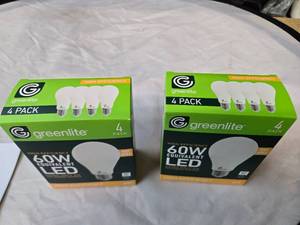 lot 174 image: Lot of 8 LED Greenlite 60W Equivalent Light Bulbs (4 packs in each of the two boxes) New