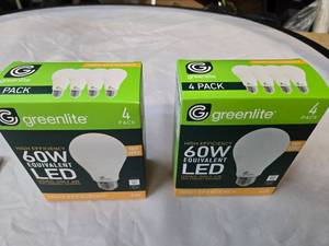 lot 176 image: Lot of 8 LED Greenlite 60W Equivalent Light Bulbs (4 packs in each of the two boxes) New