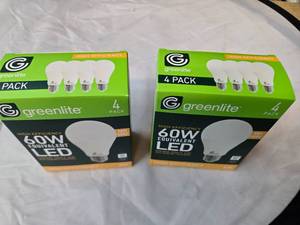 lot 177 image: Lot of 8 LED Greenlite 60W Equivalent Light Bulbs (4 packs in each of the two boxes) New