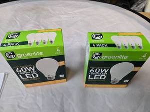 lot 180 image: Lot of 8 LED Greenlite 60W Equivalent Light Bulbs (4 packs in each of the two boxes) New