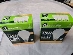 lot 181 image: Lot of 8 LED Greenlite 60W Equivalent Light Bulbs (4 packs in each of the two boxes) New