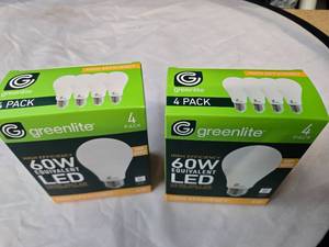 lot 182 image: Lot of 8 LED Greenlite 60W Equivalent Light Bulbs (4 packs in each of the two boxes) New
