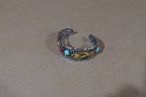 lot 149 image: Navajo Style Turquoise and Red Coral Silver Tone Bracelet
