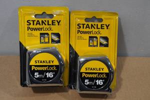 lot 74 image: 2 Stanley 165m Tape Measures