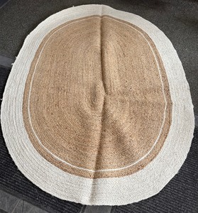 lot 26 image: Hearth & Hand Woven Oval Area Rug 5x7