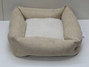 lot 77 image: Boots & Barkley Pet Faux Fur Bottom Bolster Cuddler Dog Bed - Small - Tan