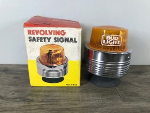 lot 27 image: Revolving Safety Signal Light that Says Bud Light on it