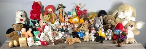 lot 61 image: Lot of Stuffed Animals & More - McDonalds - Smurf - Beanie Babies - Garfield - Coca Cola
