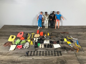 lot 69 image: Lot of 4 1971 Mattel Dolls with Accessories