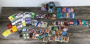 lot 76 image: Lot of Collectible Trading Cards & More - Sports Cards - Pokmon - Pocahontas - Star Wars - Bakugan - Batman and More