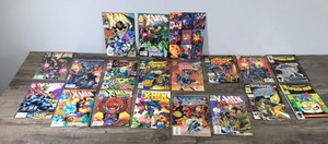 lot 116 image: Lot of 18 Marvel Comic Books and 1 Sheet of Marvel Cards