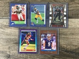 lot 393 image: Lot of 5 Football Cards - Jerry Rice - Tony Romo - Travis Kielce and More