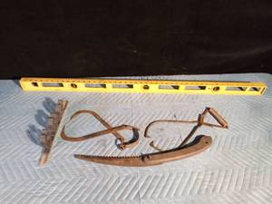 lot 249 image: Vintage ice tongs, Vintage saw, Level and lawn tools holder