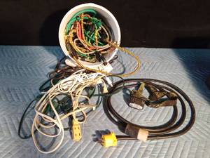 lot 241 image: Extension cords and bucket of bungee straps