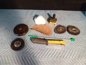 lot 242 image: 2) 100ft tape measurers, staple hammer, 2 steel brush drill discs, sand paper discs, dust masks and more