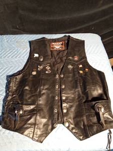 lot 220 image: Leather Vest with buffalo nickle snaps and several pins