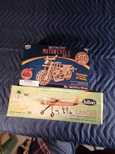 lot 197 image: Model wood plane and matchstick model motorcycle kits