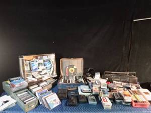 lot 193 image: Cassettes, vintage cassette players, CDs, and cassette case