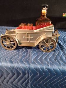 lot 196 image: Vintage metal car with decanter and 4 shot glasses in it