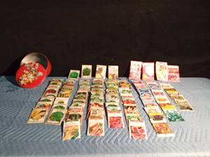 lot 177 image: Tin of flower and vegetable seeds