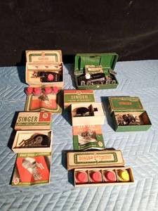 lot 172 image: Vintage Singer sewing attachments - Most in original boxes