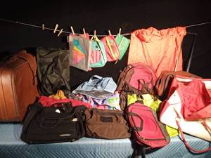 lot 367 image: Large Stetson suitcase full of handbags, coolers and more