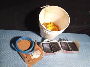lot 363 image: Pail of new auto body filler spreaders and 4 Brad hose