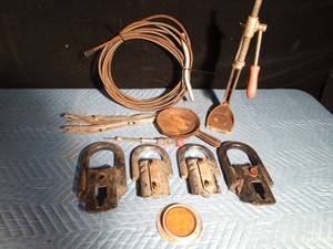 lot 353 image: 3 ton hooks, 2 cast iron pans, vintage bottle capper, sewer snake, tools, reflector