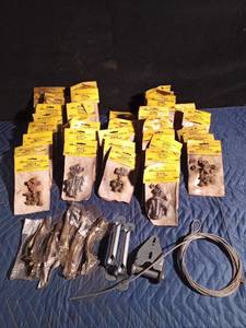 lot 334 image: Pail of new nut & bolts in pkgs, door handles, hinges and steel cable