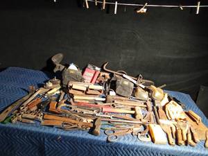 lot 304 image: tote of tools with tool belt and knee pads