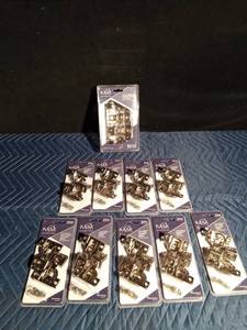 lot 297 image: 1 New 10pk and 9) 2pk of cupboard hinges