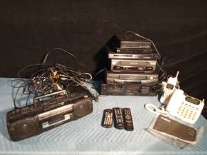 lot 159 image: Box of electronics - Cassette, DVD, CD, VHS players, radio, and more