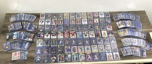 lot 422 image: Lot of 250 Plus Sports Cards - Inserts - Rookies - Stars (looks like its mainly Baseball - Hockey - Football & Basketball)