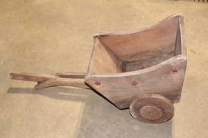 lot 90 image: Antique Wooden Wheelbarrow with Red Star Accents